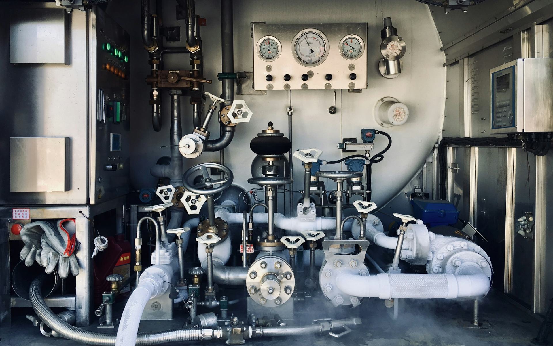 Frosted valves and gauges on refrigeration plant pipework